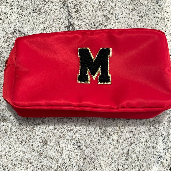 Red cosmetic bag new without tags with capital M. Never used. - Picture 1 of 6